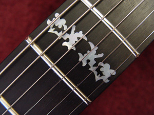 Fingerboard inlay