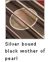 Silver bound black mother of pearl