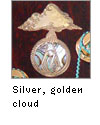 Silver inlaid with golden mop
