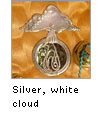Silver inlaid logo with shell