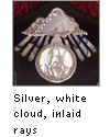 silver inlaid logo with rays